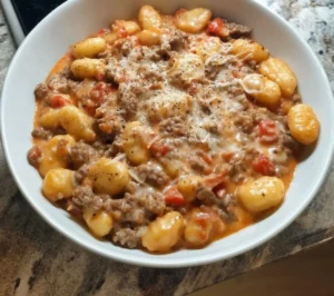 Creamy tomato gnocchi served in a bowl, perfect for dinner